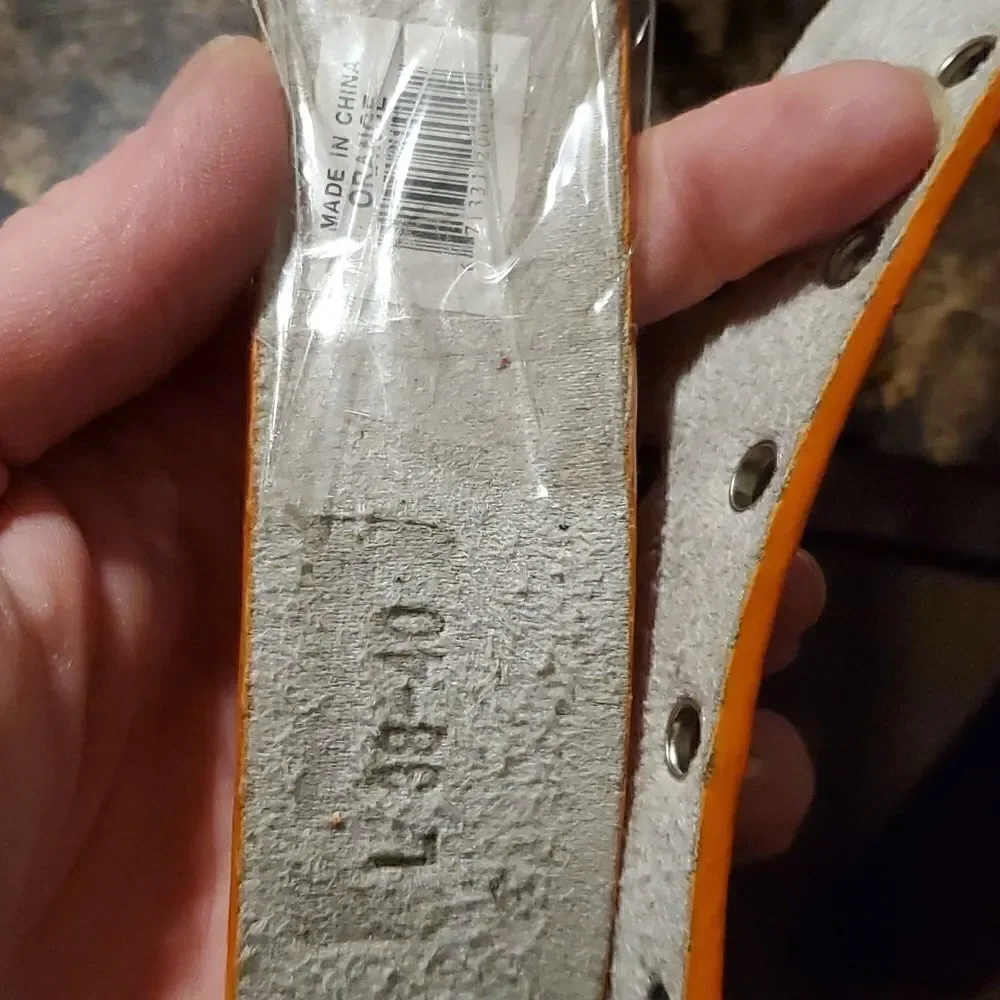 1.5 inch wide orange riveted belt